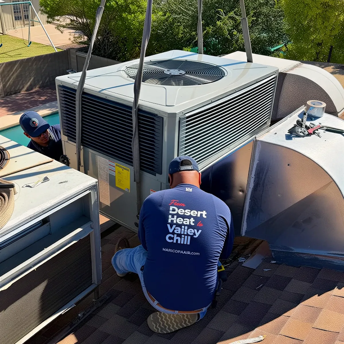 Maricopa Air technician installing a residential rooftop AC unit in Scottsdale